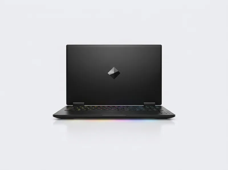Black gaming laptop with diamond OMEN logo on lid, RGB keyboard lit
