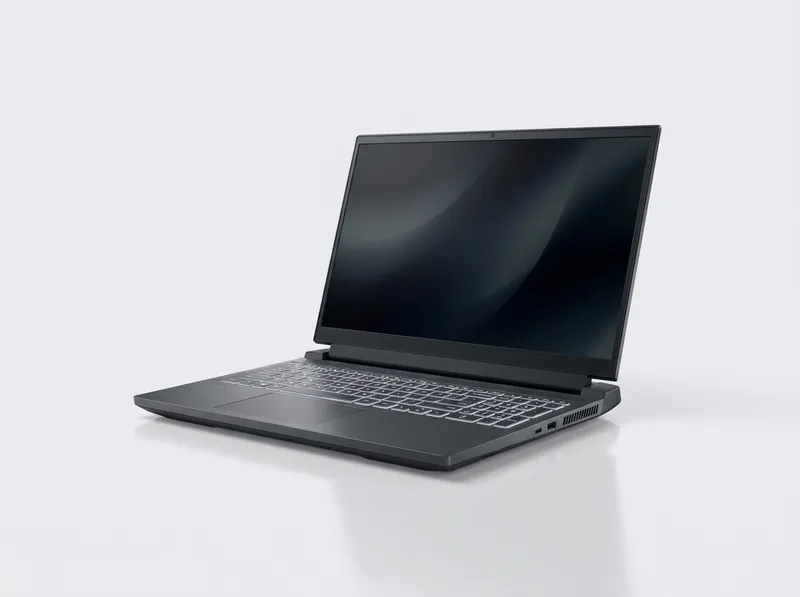 Dark grey gaming laptop with backlit keyboard and rear thermal vents